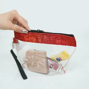 کیف آرایشی طلقی رونیا با نوار لبه اکلیلی قرمز و لوازم آرایشی داخل آن - تبریز شیک